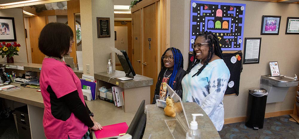 staff talking to patient
